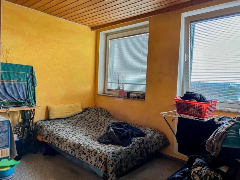 Immobilien GmbH mit vermieteter Eigentumswohnung in Bochum zimmer