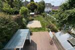 Großzügiges Reihenmittelhaus mit sonnigen Garten und eigener Garage
