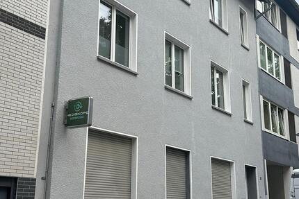 Attraktives Mehrfamilienhaus mit Büroflächen zimmer