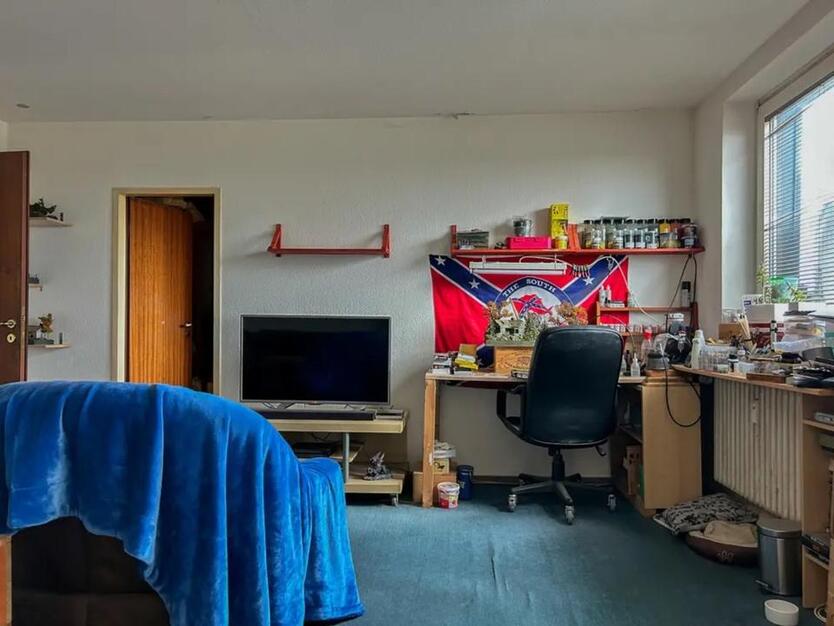 Immobilien GmbH mit vermieteter Eigentumswohnung in Bochum zimmer