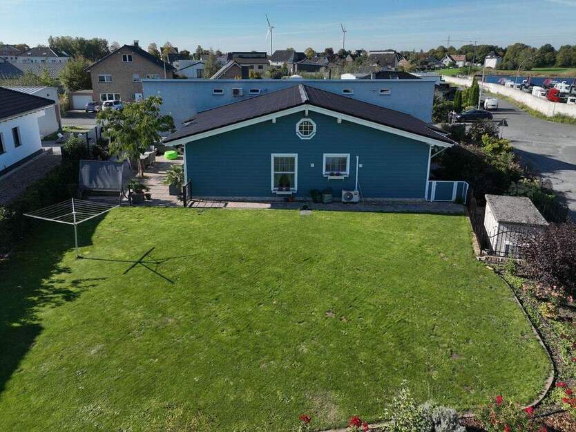 Ein lichtdurchfluteter Bungalow mit Gewerbehalle für die ganze Familie in Top-Wohnlage von Bork zimmer