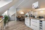 Wohnen auf höchstem Niveau - Top DG-Wohnung in zentraler Lage