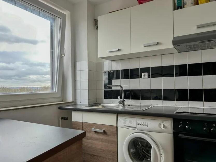 Immobilien GmbH mit vermieteter Eigentumswohnung in Bochum zimmer