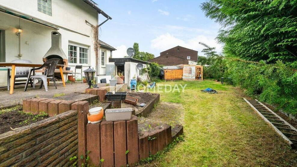 Doppelhaushälfte mit modernisierter Ausstattung, Doppelgarage und nachhaltiger Energieversorgung 5 zimmer