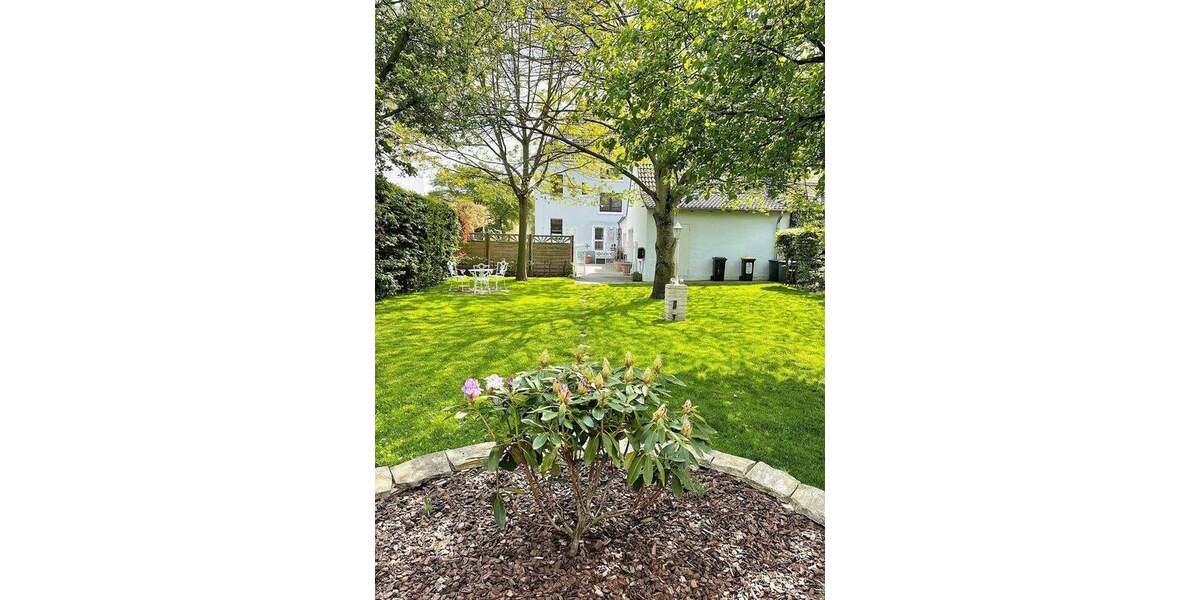 Wohnen und Arbeiten: Stilvolles Mehrfamilien- und Geschäftshaus mit großem Garten. 1 zimmer