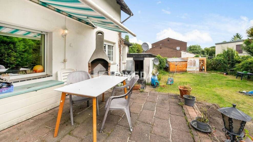 Doppelhaushälfte mit modernisierter Ausstattung, Doppelgarage und nachhaltiger Energieversorgung 5 zimmer