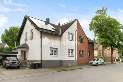 Doppelhaushälfte mit modernisierter Ausstattung, Doppelgarage und nachhaltiger Energieversorgung 5 zimmer