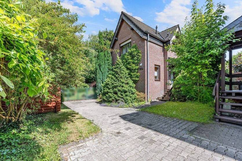 Gartenidylle trifft Gemütlichkeit - liebevoll gepflegte Doppelhaushälfte mit ansprechender Raumaufteilung in Bochum Wiemelhausen